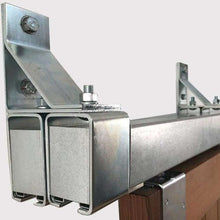 Load image into Gallery viewer, Galvanized Box Rail 600lb Bypass Hardware installed on brown barn door