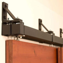 Load image into Gallery viewer, Black Box Rail 400lb Bypass installed on a red door
